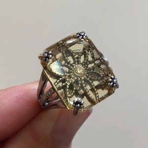 Yellow ring with flower design. Size 7.5 Avon